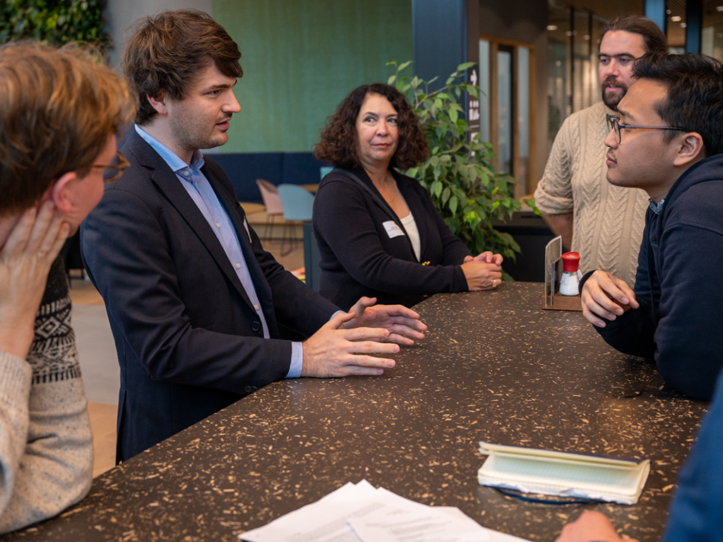 People discuss round table on Artificial Intelligence